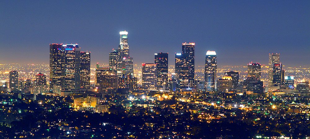 A view of the city skyline at night.